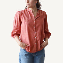 Load image into Gallery viewer, Person wearing a red shirt and blue jeans on a white background
