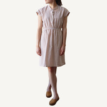 Load image into Gallery viewer, Woman wearing a checkered dress on a white background