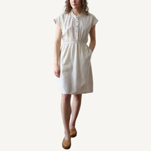 Load image into Gallery viewer, Woman wearing a white dress against a plain background
