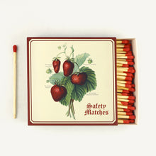 Load image into Gallery viewer, Matchbox with strawberry illustration and safety matches on a white background