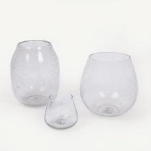Load image into Gallery viewer, Three clear glass vases of different sizes on a white background
