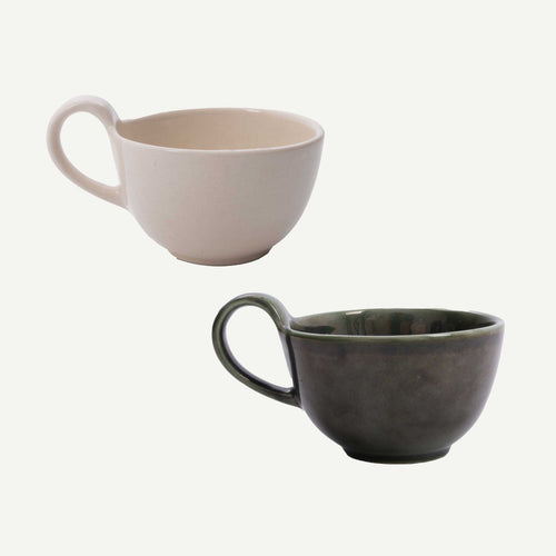 Two ceramic mugs, one beige and one gray, on a white background