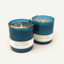 Load image into Gallery viewer, Two blue Civil Alchemy candles with "Mineral Spring" labels on a white background
