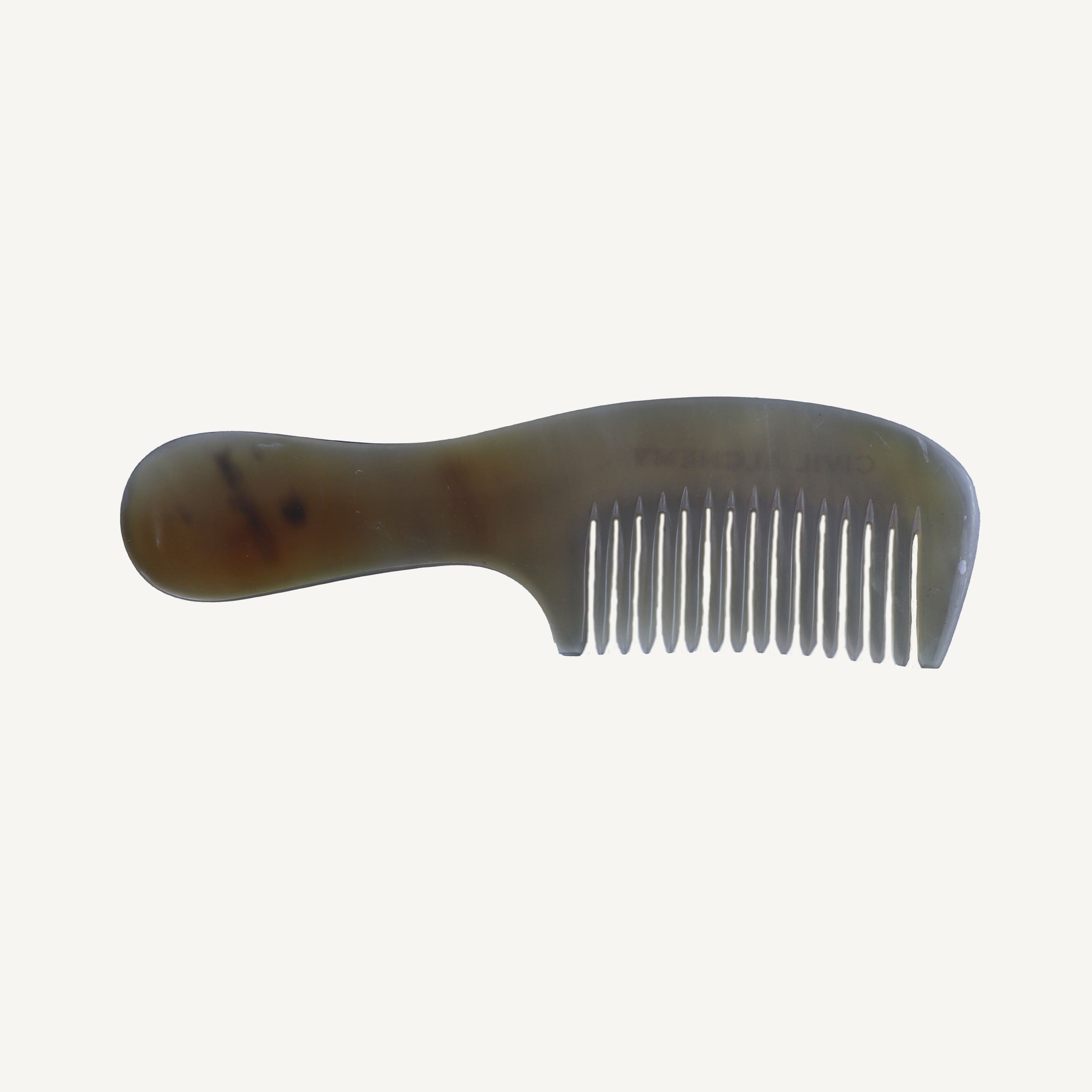 Brown comb on a white background