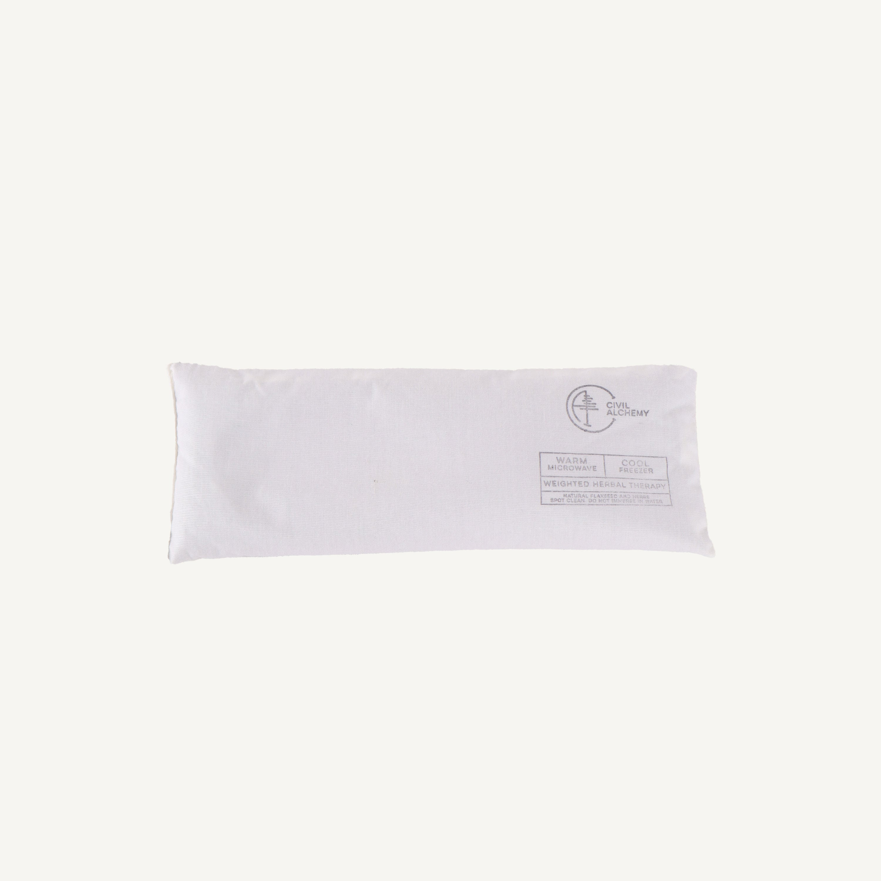 White pillow on a white background with a brand logo.