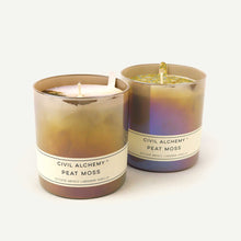 Load image into Gallery viewer, Two candles with 'Civil Alchemy Peat Moss' label on a white background
