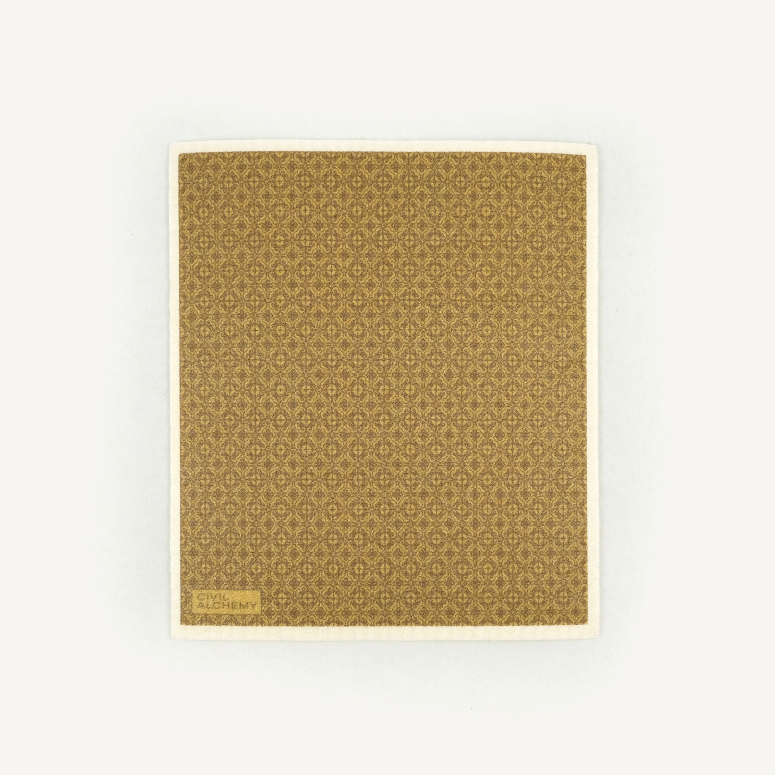 Patterned brown Swedish dishcloth on a white background