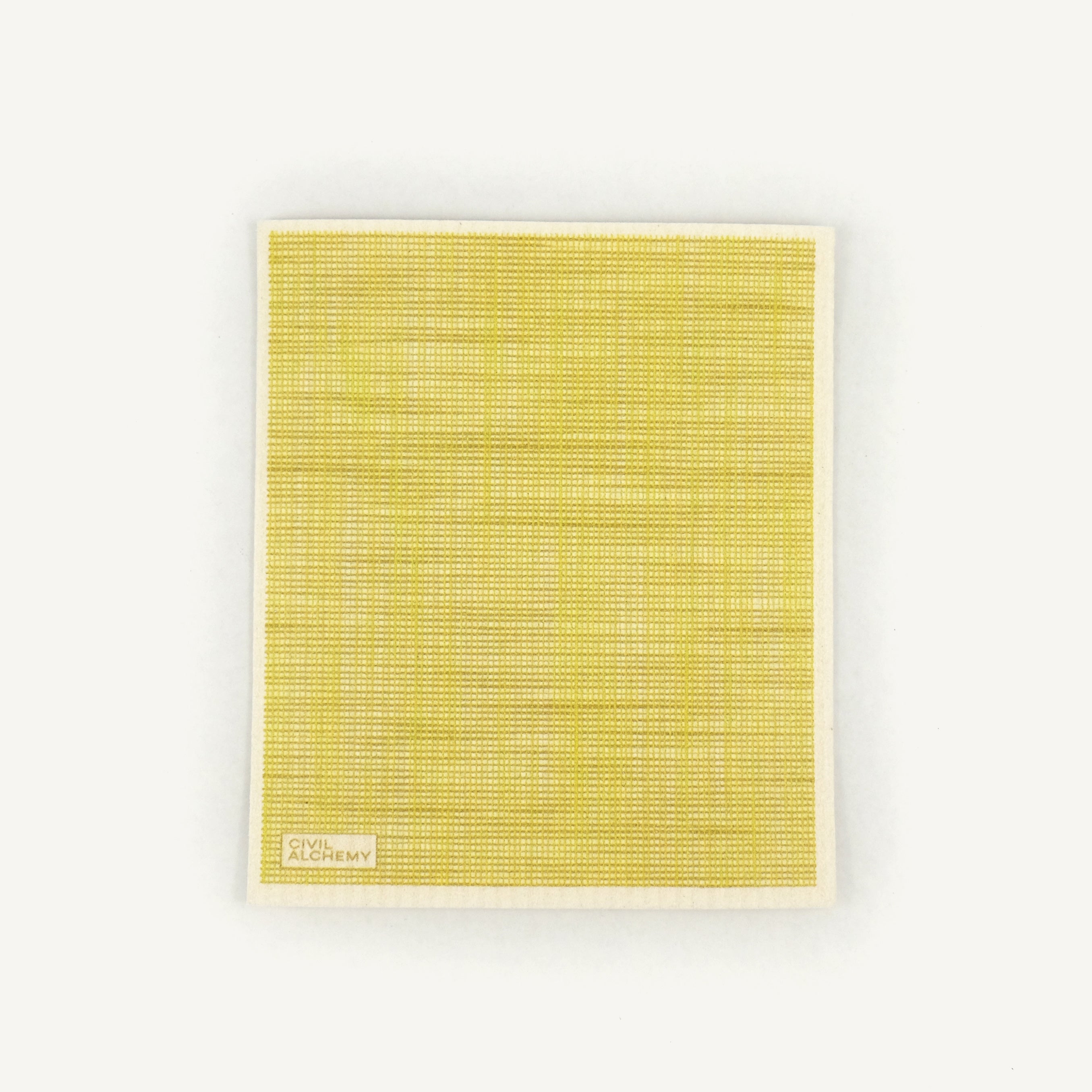 Yellow textured Swedish dishcloth with 'Civil Alchemy' logo on a white background